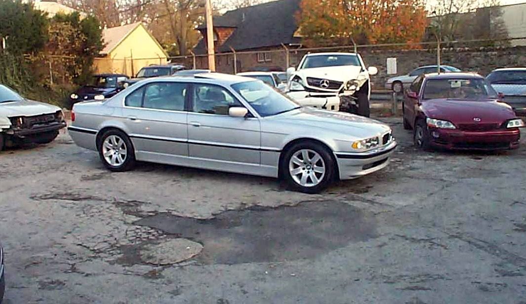 The finished BMW parked outside the shop, ready for pickup